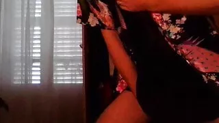 Sexy crossdresser in satin robe and satin nighties