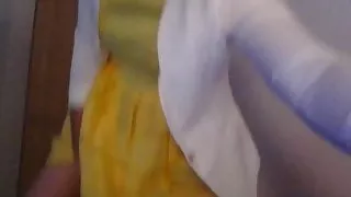 Bridesmaid crossdresser in cute yellow dress and white blaze