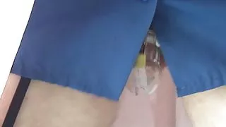 The noise of chastity cage under a nylon smock