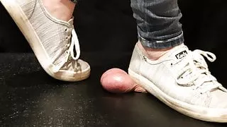 Crush the cum out of your balls under my stinky tennies