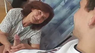 Old tailoress takes younger cock from behind