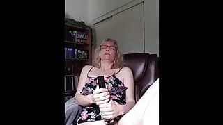 Hot milf with glasses masturbating till orgasm