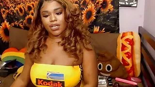 Busty Ebony chilling on cam then changing her clothes