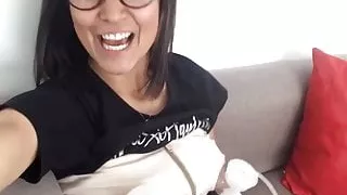 Petite Latina pumping milk from both her big nipples