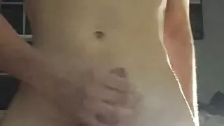 Twink jerks and shows his hole