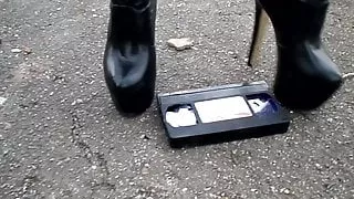 Crush video cassette with heels and platform