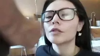 Girl in glasses takes a huge facial