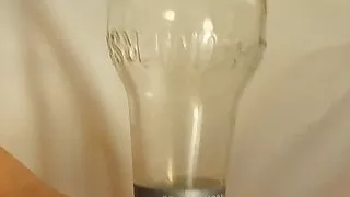 Girl masturbating with a bottle