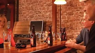 Two tourist oldmen fuck american blonde in a bar