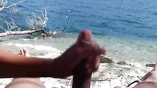 Stroking my hard dick at the beach until i cum