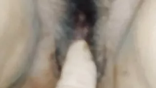 toying herself to cum