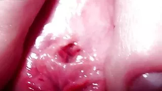 Masturbation of a large open clitoris close-up