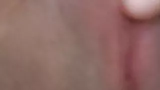 Indian slut rubs wet pussy