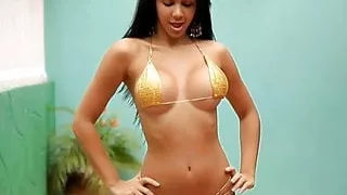 Ana Busty Gold Bikini Striptease