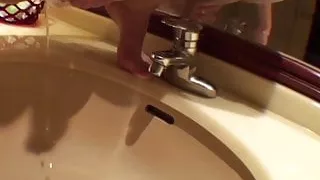 Japanese lesbo tied up and teased before peeing in the sink