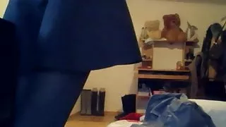 hacked laptop camera. girl puts on pantyhose