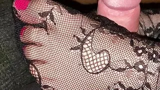 Fishnet foot job