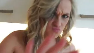 Kinky blonde in lingerie fingers her slit