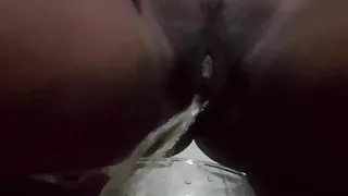 Ebony piss in fish bowl