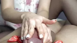 Sexy girl in nylons jerks his cock in a close up POV amateur