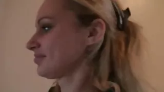 Roxy takes care of her mirror while naked