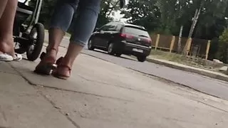 Pretty young step mom in sandals