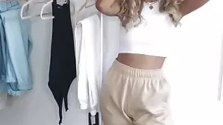 blonde slut trying on more clothes