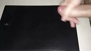 Huge cumshot on colleague laptop in the office