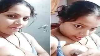 Horny desi bhabhi sucking her boobs