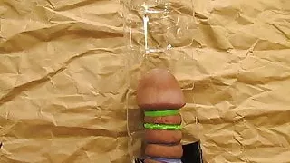 cock bathed in hot wax