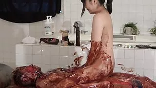 Japanese Femdom Wet and Messy with Chocolate Sauce