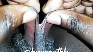 Girlfriend plays with her sweet black pussy lips