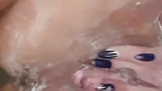 Hot Babe Katy works her pussy hard after shower and pisses