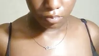 Hot black babe playing with big boobs