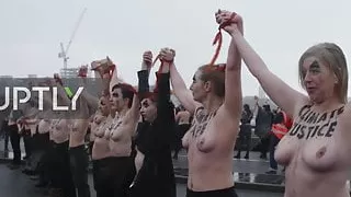 Topless activists block London Bridge