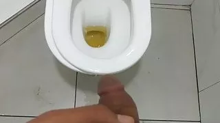 Teen Boy Peeing In Toilet