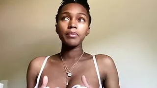 Cute young Ebony pumps her titty milk for Youtube