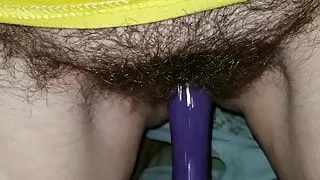 Girlfriend decides to dildo her wet hairy pussy