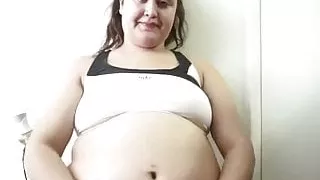 Obese woman eats her workout buddy