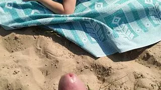 Jerked dick and came on a woman sunbathing on a wild beach