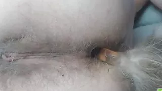 Tail plugged deep into hairy asshole