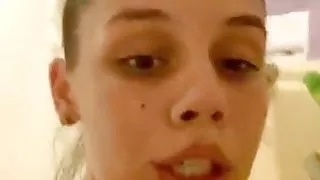 Sexy babe showering and showing tight ass