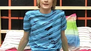 Twink Preston Andrews strokes his large cock post interview