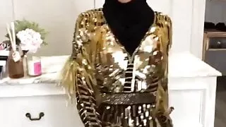 Australian hijabi model dancing on tight dress for boss