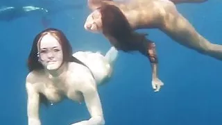 2 Hot Girls naked in the sea swimming