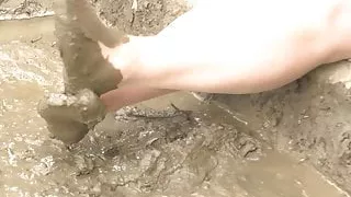 UK MILF Tights in mud. Feet rubbing amateur wife