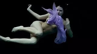 Aneta big tits and purple dress in the pool