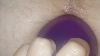 Hubby getting our big anal plug shoved in for the 1st time