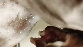 French Ebony pissing on my cock in the shower