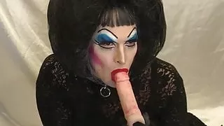 Heavy Makeup Slut Sucks and Deep throats Dildo